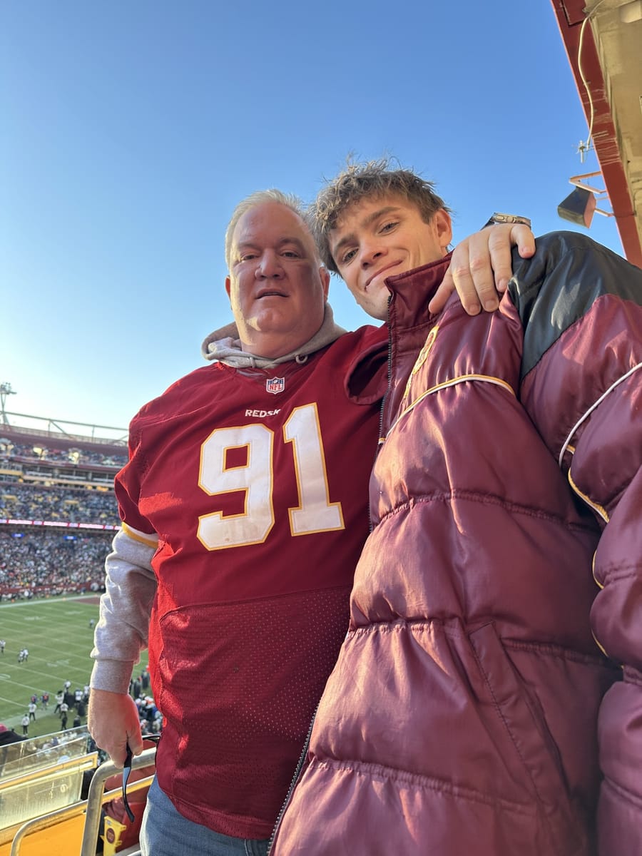 Ben with his father at an NFL game